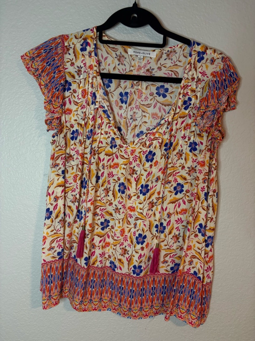Rose & Olive Cream Floral Tassel V-Neck Blouse with Blue Accents